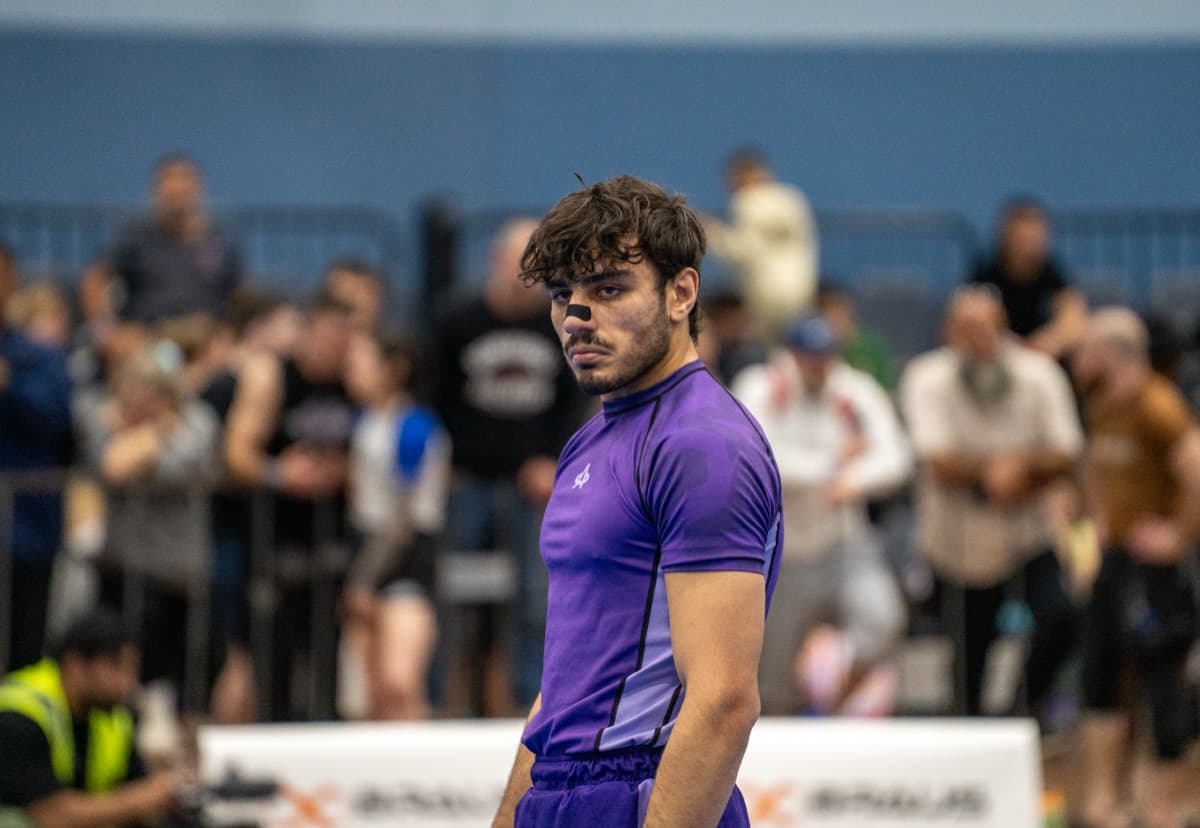 BJJ competitors mid-match at a Sydney tournament