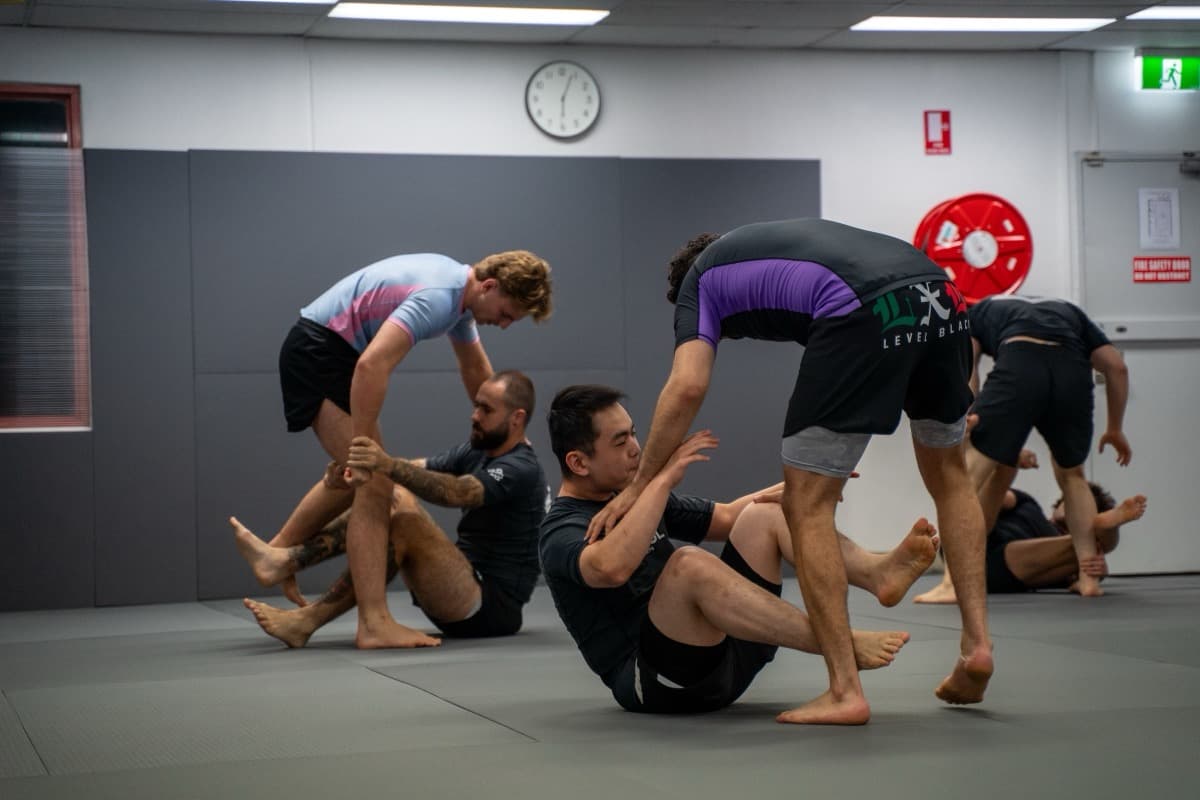 Close-up of a student's focused expression during live sparring