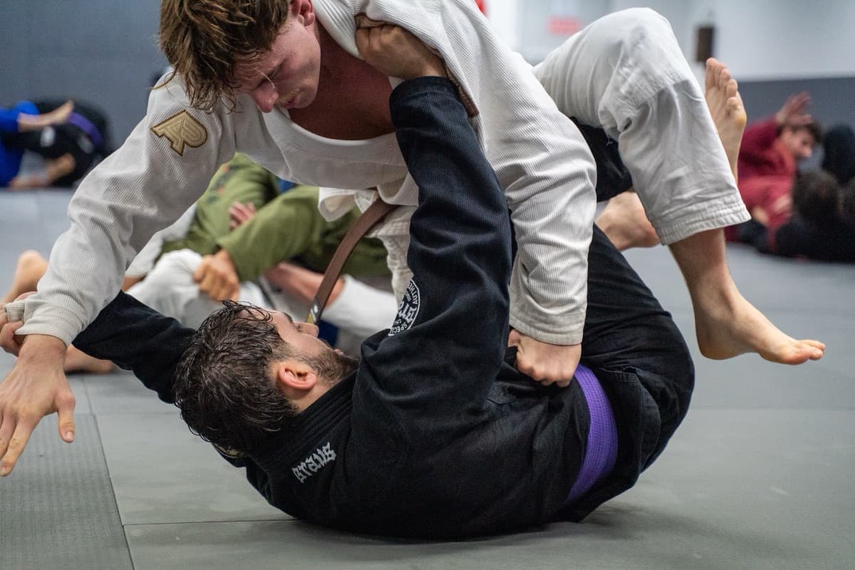 Group training session, students drilling technique in pairs